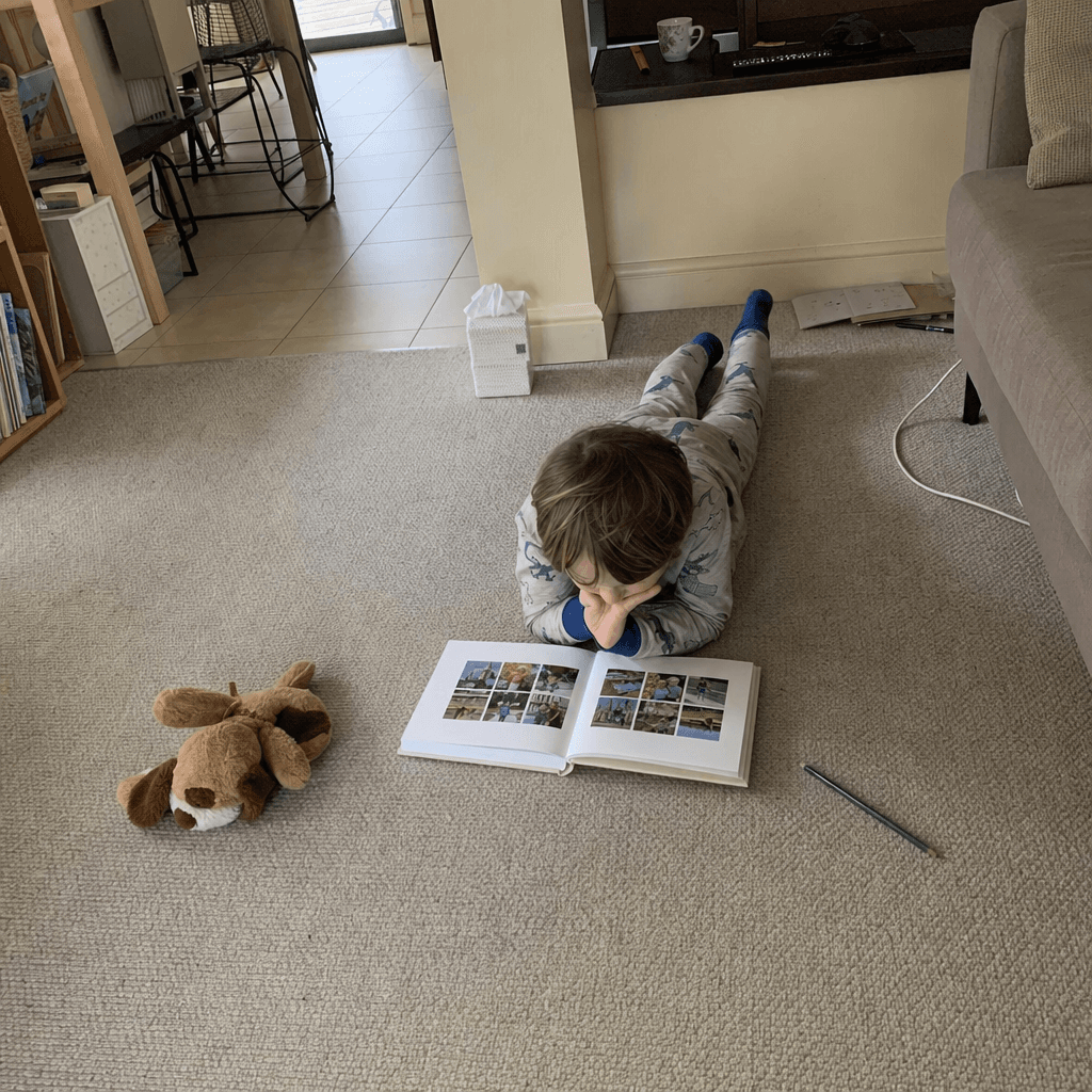 Photo of Charles E. with their Memsy book